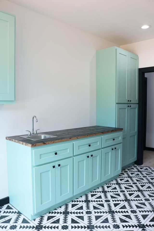Image of custom residential laundry room completed project.